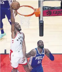  ?? STEVE RUSSELL TORONTO STAR ?? Kawhi Leonard slams home two of his 45 points — a career playoff high — in the Raptors’ Game 1 win over the Sixers.