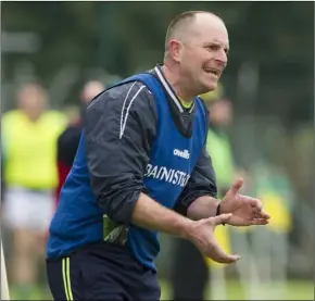  ??  ?? Team manager James Bolger urging his players on from the sideline.