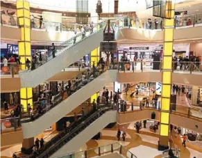  ?? ?? Shops and malls are alive and alight again, sparking joy and drawing in shoppers tired of virtual buys. — IZZRAFIQ alias/the Star