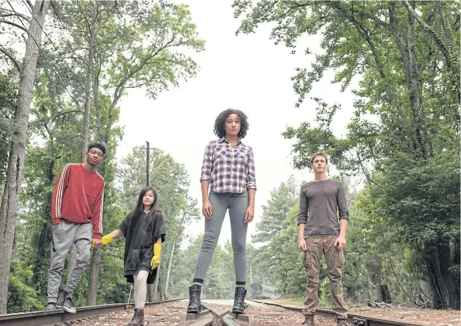 ??  ?? JOINING PSYCHIC FORCES: From left, Skylan Brooks, Miya Cech, Amandla Stenberg and Harris Dickinson in a scene from, ‘The Darkest Minds’. The film opened in theatres on Friday.