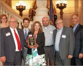  ?? SUBMITTED PHOTO ?? Owen J. Roberts School Board President Bill LaCoff, Chief Financial Officer/Board Secretary, Jaclin Krumrine, Director of Facilities Dennis Rozak and Assistant Director of Facilities Mike Shelgren were in Harrisburg to accept an award from PUC...