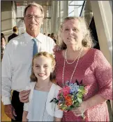  ??  ?? Parents of the groom Steven and Luanne Davidson of Nashville, Tenn., with their granddaugh­ter Lindley