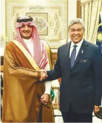  ??  ?? Deputy Prime Minister Datuk Seri Ahmad Zahid Hamidi receiving a courtesy call from Saudi Arabia Interior Minister Prince Abdulaziz Saud at his office in Putrajaya yesterday. The visit was to discuss collaborat­ions on security matters and foster...