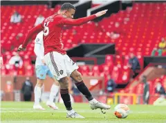  ?? AFP ?? Manchester United’s Mason Greenwood scores against West Ham.