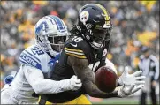  ?? DON WRIGHT / AP ?? Steelers wide receiver Diontae Johnson (right) can’t hold onto a pass from Mason Rudolph as Lions cornerback Jerry Jacobs defends Sunday in Pittsburgh. A 16-16 tie ended Pittsburgh’s four-game win streak.