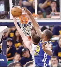  ??  ?? KEVIN DURANT of the Golden State Warriors defends against Gordon Hayward of the Utah Jazz in the second half of the Warriors’ 102-91 win in Game Three of the Western Conference Semifinals at Vivint Smart Home Arena on May 6 in Salt Lake City, Utah.