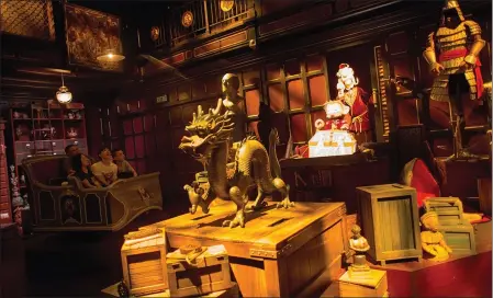  ?? LAM YIK FEI — GETTY IMAGES ?? Hong Kong Disneyland’s Mystic Manor is among the attraction­s around the globe tied to the Society of Adventurer­s and Explorers, a backstory element concocted to link various tales in the Disney universe, like those underlying the Jungle Cruise attraction in Anaheim and Tower of Terror in Tokyo.