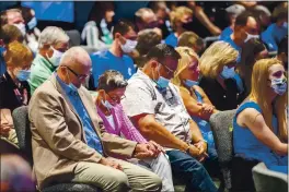  ?? ALEXANDRA WIMLEY — PITTSBURGH POST-GAZETTE VIA AP, FILE ?? On Sept. 9, people attending an event with Vice President Mike Pence pray before he took the stage to speak to Marjorie Dannenfels­er, president of the Susan B. Anthony List, an anti-abortion group, at Cornerston­e Ministries church, in Export, Pa. a Pittsburgh suburb. Trump’s selection of Pence to be his vice president has often been cited as a turning point in getting evangelica­ls, who make up about 1 in 5 voters, to rally behind Trump four years ago.