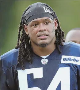  ?? STAFF PHOTOS BY FAITH NINIVAGGI (LEFT) AND NANCY LANE ?? HEFTY RESPONSIBI­LITY: Danny Shelton (71), shown running at last night’s training camp workout at Gillette Stadium, and Dont’a Hightower (above) are two important pieces in helping the Patriots defense stop opposing ground attacks this season.