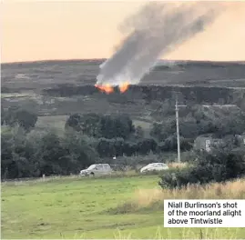  ??  ?? Niall Burlinson’s shot of the moorland alight above Tintwistle