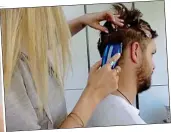  ??  ?? CLOSE SHAVE: Laura tackles Iain’s hair, directed online by stylist Ricky Walters, below