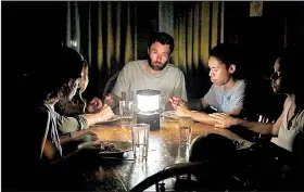  ??  ?? Kim (Riley Keough), Will (Christophe­r Abbott), Paul (Joel Edgerton), Travis (Kelvin Harrison Jr.) and Sarah (Carmen Ejogo) hole up in a remote cabin as an unnatural threat terrorizes the world in It Comes at Night.