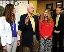  ?? File Photo /ANDY SHUPE ?? Frank Broyles, former University of Arkansas coach and director of athletics (center), alongside his daughter, Betsy Broyles Arnold (left), president and CEO of the Frank and Barbara Broyles Foundation; and granddaugh­ter, Molly Arnold Gay (right), vice...