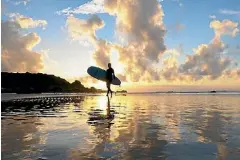  ?? SABIN BROOK ?? Surfing in Westport is surprising­ly popular.