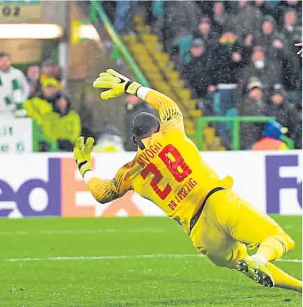  ?? Picture: SNS Group. ?? Odsonne Edouard restores Celtic’s lead by firing home Ryan Christie’s pass.