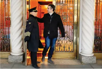  ?? RICHARD DREW/THE ASSOCIATED PRESS ?? Michael Cohen, former lawyer to President Donald Trump, leaves his apartment on New York’s Park Avenue Friday.