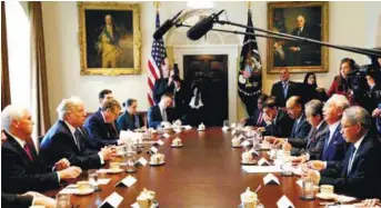  ??  ?? Trump sitting across Najib during the delegation meeting at the White House yesterday.