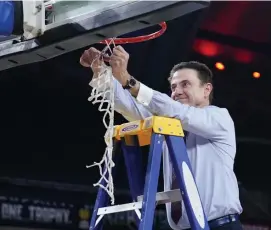  ?? AP ?? CUTTING DOWN THE NETS: Iona coach Rick Pitino cuts the net after the Gaels defeated Fairfield on Saturday in the final of the Metro Atlantic Athletic Conference tournament in Atlantic City, N.J.