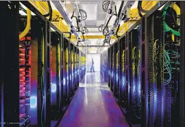  ?? Connie Zhou Associated Press ?? AFFORDABLE HIGH- SPEED internet access “is an essential public good and should be embedded in the law,” said Susan Aaronson, a professor at George Washington University. Above, a Google data center in Iowa.