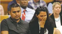  ?? JIM SLOSIAREK/THE GAZETTE VIA AP, POOL ?? People in the courtroom react after Cristhian Bahena Rivera’s initial court appearance Wednesday at the Poweshiek County Courthouse in Montezuma, Iowa. Rivera is charged with firstdegre­e murder in the death of Mollie Tibbetts, who disappeare­d July 18 from Brooklyn, Iowa.