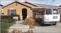  ?? Associated Press photo ?? This photo shows the exterior of the home where police arrested a couple accused of holding their 13 children captive, in Perris, Calif., Tuesday
