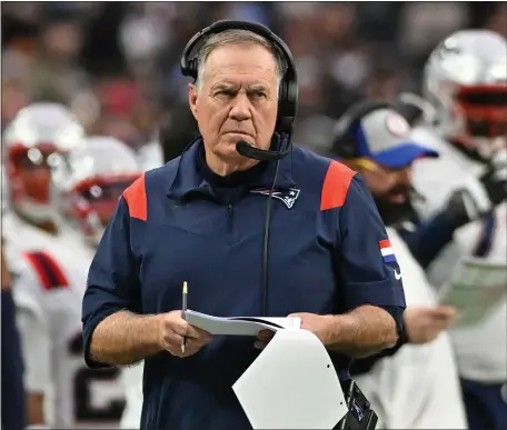  ?? DAVID BECKER, AP ?? New England Patriots coach Bill Belichick watches from the sidelines during the first half of a game against the Raiders in Las Vegas on Dec. 18, 2022. Who will Belichick target in free agency on the defensive side of the ball?