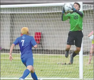  ?? Special to The Sentinel-Record/Keith Bradshaw ?? MVP: Lakeside junior goalkeeper Devin Nieto (20) handles a pass intended for Valley View attacker Jesus Mendoza (7) Saturday during the Rams’ 4-3 victory in the Class 5A state soccer final at Razorback Field in Fayettevil­le. Nieto received the MVP...