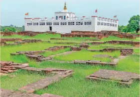  ?? ?? Lumbini, the Birthplace of the Lord Buddha- Surroundin­g the Mayadevi Temple are the foundation­s of ancient monasterie­s that were built here for pilgrims as early as the 3rd century BC. – © Michael Turtle