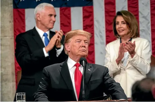  ?? AP ?? President Donald Trump gives his State of the Union address to a joint session of Congress as Vice President Mike Pence and House Speaker Nancy Pelosi look on.