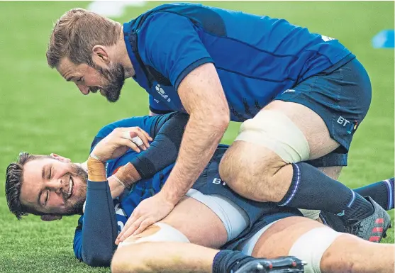 ?? Picture: SNS. ?? John Barclay, right, plans to leave good friend Ryan Wilson broken-hearted when Glasgow clash with Scarlets tomorrow.
