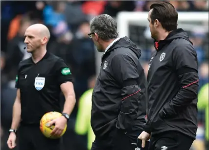  ??  ?? Hearts boss Craig Levein and Bobby Madden failed to see eye to eye in last week’s match against Rangers