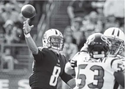  ?? THE ASSOCIATED PRESS ?? Tennessee Titans quarterbac­k Marcus Mariota passes against the Houston Texans during last Sunday’s game in Nashville.