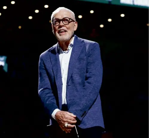  ?? DANIELLE PARHIZKARA­N/GLOBE STAFF ?? During a haltime ceremony for Mike Gorman, who is retiring after a 43-year career as the team’s play-by-play voice, the Celtics announced that TD Garden’s television broadcast table will be named in his honor.