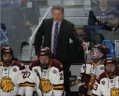  ?? Jeffrey T. Barnes The Associated Press ?? Minnesota Duluth, led by coach Scott Sandelin, gained a berth in the NCAA hockey tournament, which gets underway Friday.