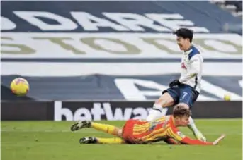  ??  ?? Son Heung-min scores Tottenham Hotspur’s second goal against West Bromwich Albion during their English Premier League match at Tottenham Hotspur Stadium in London yesterday. Spurs won 2-0, with Harry Kane also scoring. — Reuters