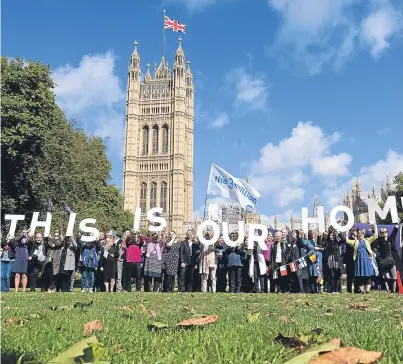  ??  ?? EU citizens gathered at the UK Parliament yesterday seeking guarantees their rights will not be diluted after Brexit. They called for a “free and simple registrati­on process” ensuring the 3.2million EU citizens in the UK and 1.2million Britons in the...