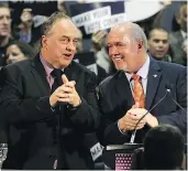  ?? — THE CANADIAN PRESS FILES ?? B.C. Green Leader Andrew Weaver and Premier John Horgan are hoping B.C. votes in favour of proportion­al representa­tion.
