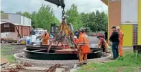 ?? GARY SEVERN/ RSR ?? The eight-ton turntable being lifted into its pit at the Ribble Steam Railway on May 24.