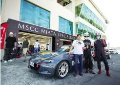  ?? ?? Mazda Motor Corp. officials Hidetoshi Kudo and Hironori Tanaka with Mazda PH president Steven Tan before they drove for several laps at the Clark Speedway.