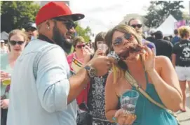  ??  ?? More than 500,000 people will attend the four-day Taste of Colorado festival in downtown Denver.