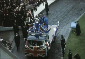  ?? ?? Rangers parade the trophy in front of the Ibrox crowd in 1972