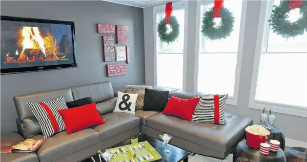  ?? Ed Kaiser/ Edmonton Journal ?? A unifying colour scheme can help tie homey, traditiona­l and designer elements together in your home. This is a great technique for creating holiday harmony.