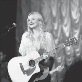  ?? JP Yim Lionsgate and Roadside Attractio ?? AJ MICHALKA stars as a teen seeking pop stardom in the faith-based story.