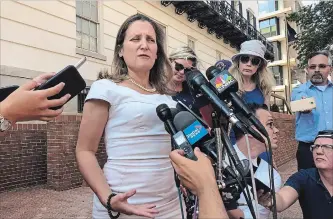  ?? LUIS ALONSO LUGO THE ASSOCIATED PRESS ?? Canadian Foreign Affairs Minister Chrystia Freeland talks to reporters outside the United States Trade Representa­tive building Thursday in Washington, where NAFTA negotiatio­ns are continuing.