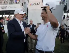  ??  ?? FROM LEFT: Republican presidenti­al candidate Donald Trump congratula­tes Adam Scott after Scott won the Cadillac Championsh­ip golf tournament March 6 in Doral, Fla. AP PHOTO