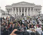  ?? MARK WILSON/GETTY IMAGES ?? Immigrants and advocates protest in front of the U.S. Capitol on Dec. 6 to urge Congress to preserve the Deferred Action for Childhood Arrivals program.