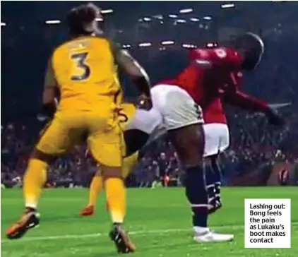  ??  ?? Lashing out: Bong feels the pain as Lukaku’s boot makes contact