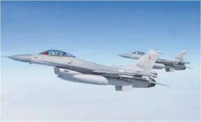  ?? Lukasz Glowala / Reuters ?? Caces F-16 en unes maniobres de l’OTAN a la ciutat polonesa de Malbork.