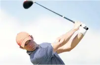  ?? Picture: MASTERPRES­S/ GETTY IMAGES ?? SWINGING LOYALTY: Rory McIlroy of Northern Ireland in action at the Sentry Tournament of Champions at the Plantation Course on Wednesday in Lahaina, Hawaii.