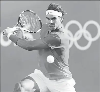  ??  ?? Return to sender: In this Aug. 12, 2016, file photo, Rafael Nadal returns during his match against Thomaz Bellucci during their quarterfin­al round match at the 2016 Summer Olympics in Rio de Janeiro, Brazil. The U.S. Open tennis tournament begins...